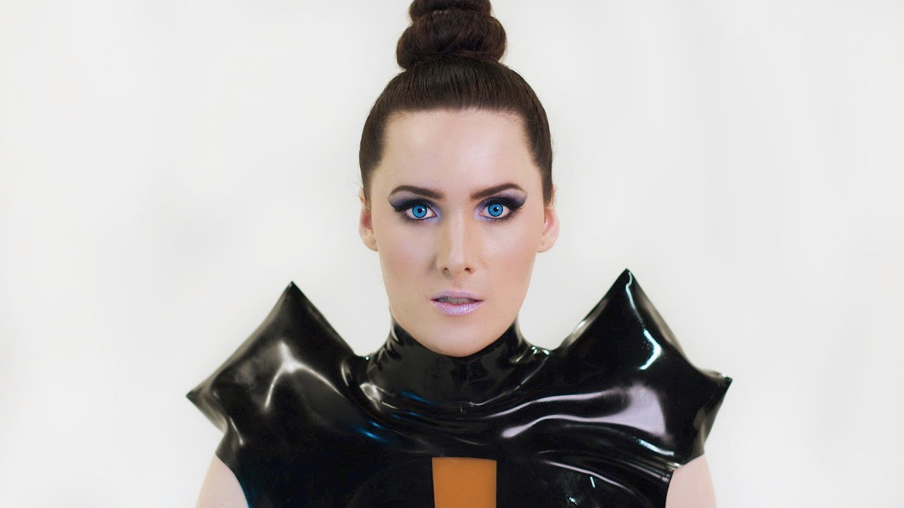 YouTube post by @PhilosophyTube for Pleaser Shoes. Caption reads: Transhumanism: "The World's Most Dangerous Idea" |....