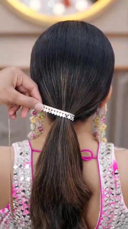 Instagram post by @the_magic_touch_27 for WeddingPlz.com. Caption reads: Navratri beautiful hairstyles ideas../traditional....