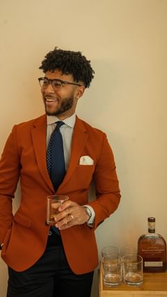 Instagram post by @treybryantstyle for Woodford Reserve. Caption reads: Kentucky Derby inspired outfit with....
