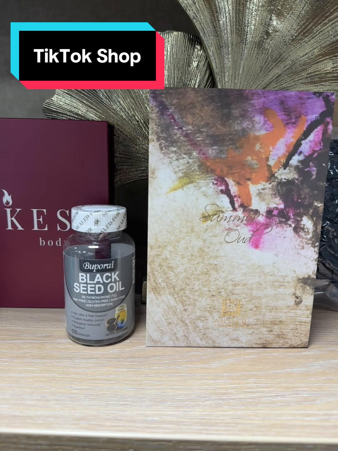 TikTok post by @iqraa15_ for CAKES Body. Caption reads: [...] of my recent TikTok Shop Purchases! @CAKES....