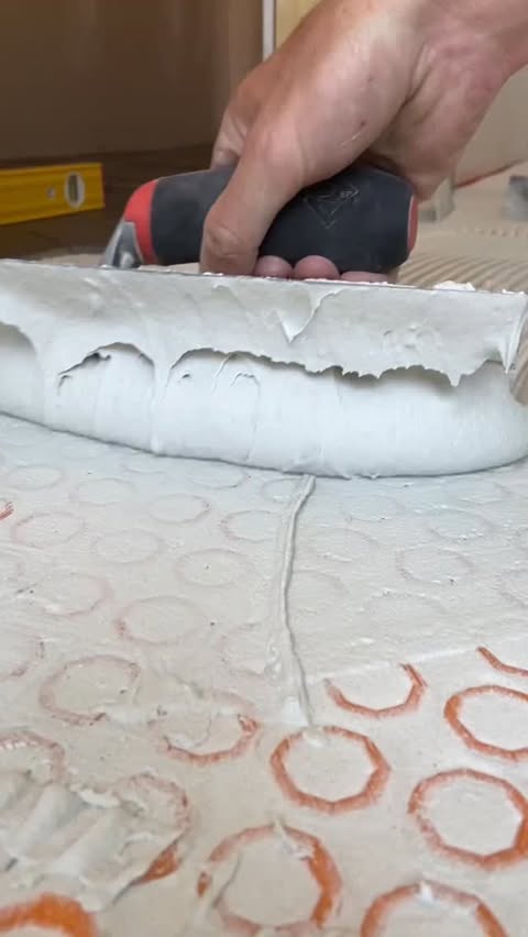 Instagram post by @dj.tiling for STABILA. Caption reads: Creamiest thinset, something about the sounds of....