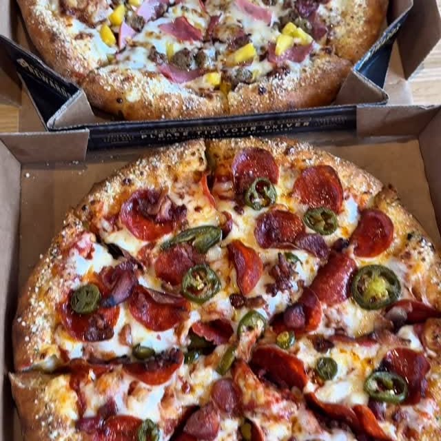 Instagram post by @jaskamreviews for Domino's. Caption reads: #ad @dominos $11.99 3 Topping Parmesan Stuffed....