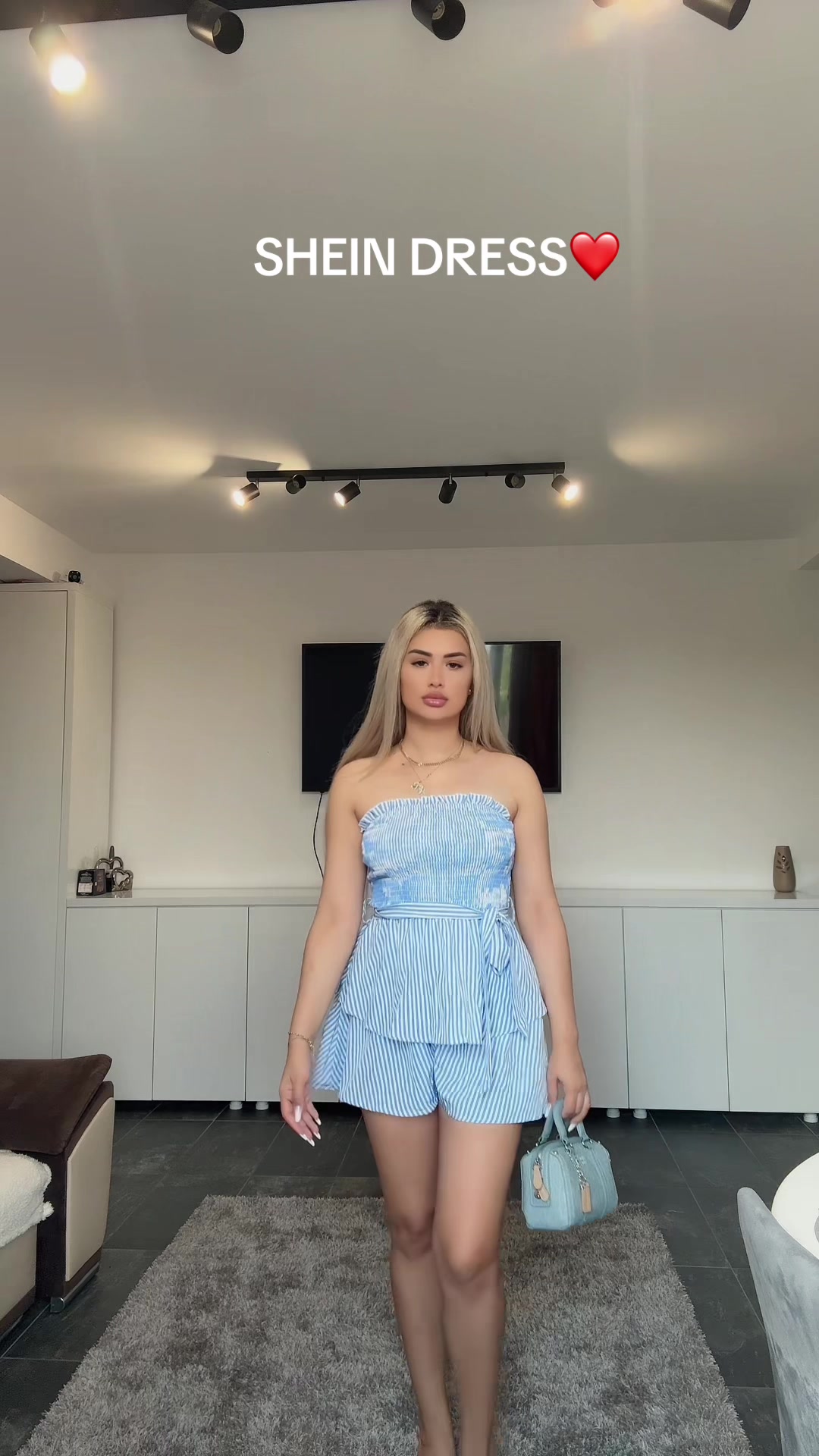 TikTok post by @alexandra.maria.cercel for VARSITIE. Caption reads: #ad Fashion for Everyone! Search 'Vacay Vibe' on....
