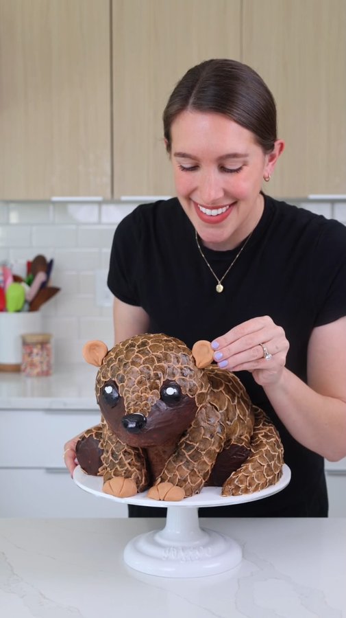 Instagram post by @chelsweets for Netflix Family. Caption reads: The cutest vegan baby pangolin cake inspired by....