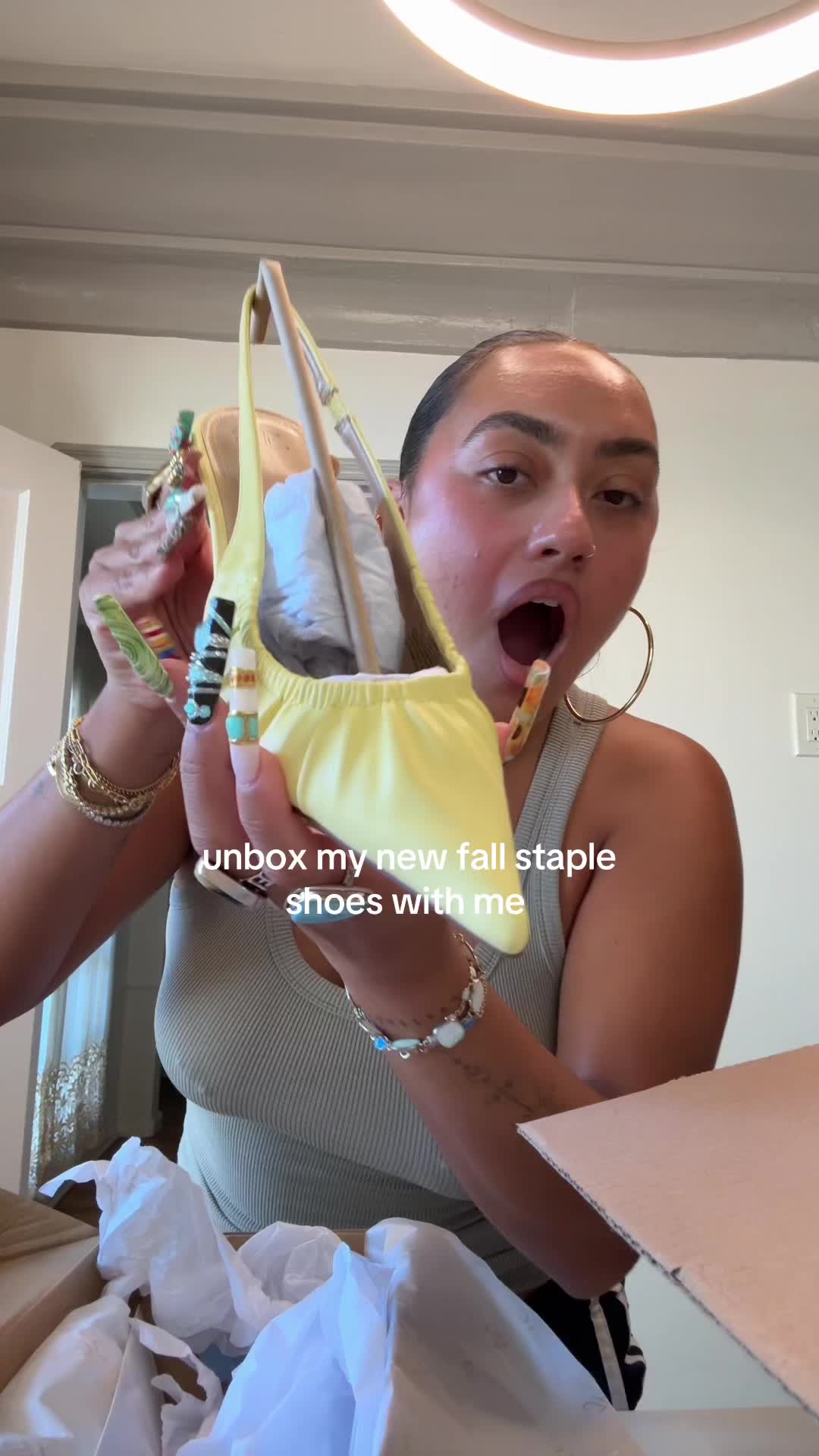 TikTok post by @blairmclurkin for JustFab. Caption reads: unbox my new fall shoes with me @JUST FAB....