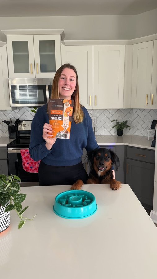 Instagram post by @wanderlustwithdogs for Instinct Pet Food. Caption reads: [...] Gut Health Raw Boost Mixers from....