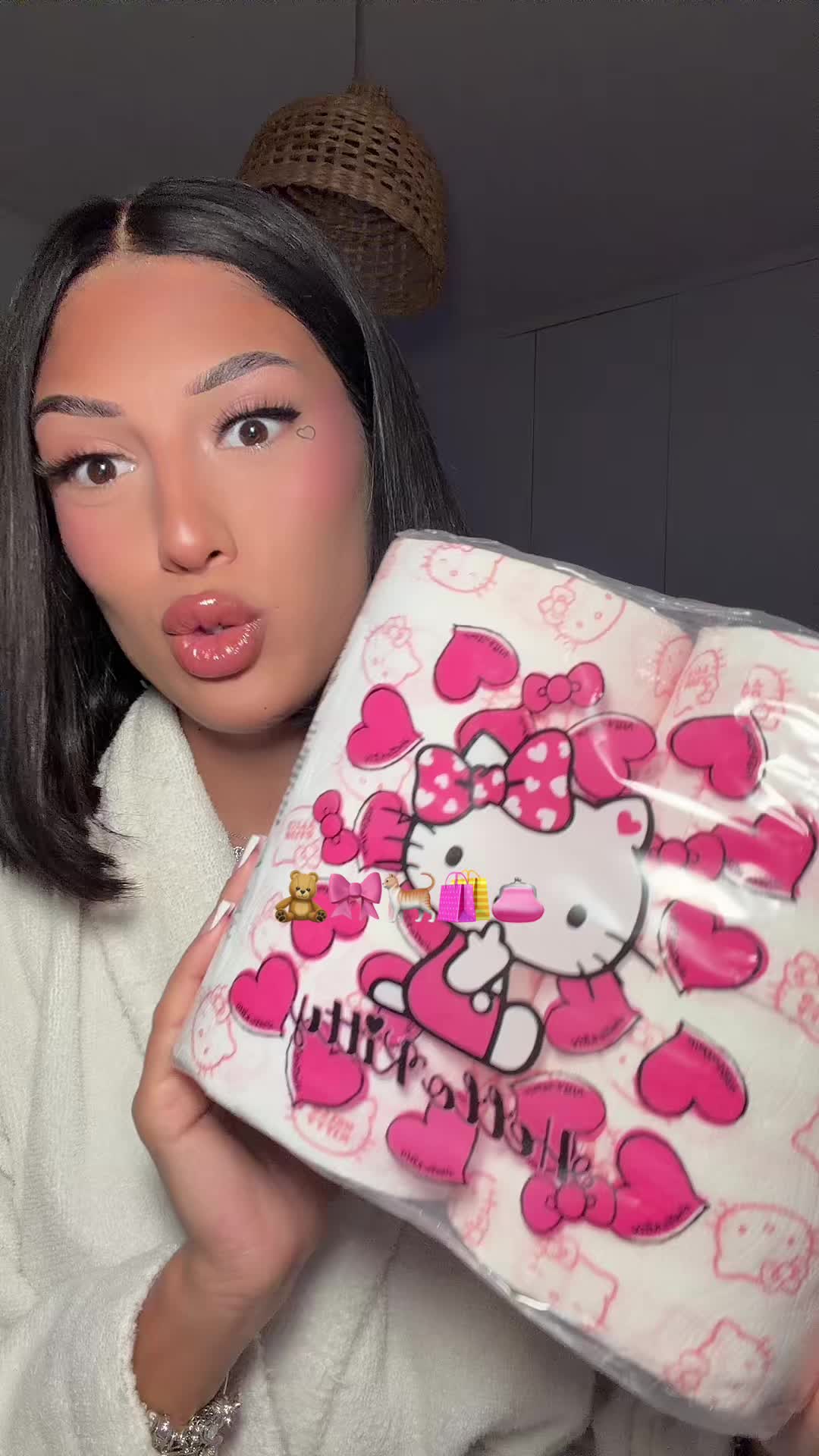 TikTok post by @debowee for Hello Kitty. Caption reads: Montrez-moi votre collection Hello Kitty 🐈🎀....