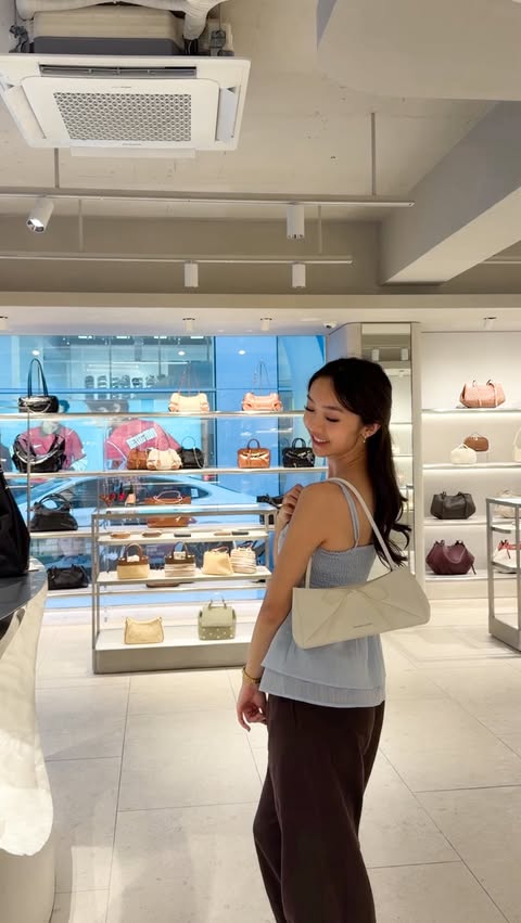 Instagram post by @tiffanys.album for CHARLES & KEITH. Caption reads: [...] to add to your bucket list honestly,....