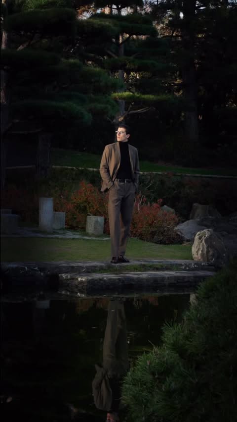 Instagram post by @joelvieten for Shaping New Tomorrow. Caption reads: Peace in the wild. Power in the suit. 

#menswear....