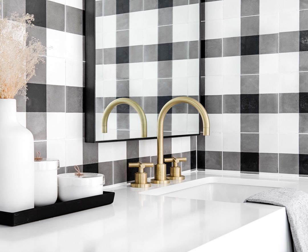 Instagram post by @lindyegalloway for MyDomaine. Caption reads: When you don’t mind that the tile is stealing the....
