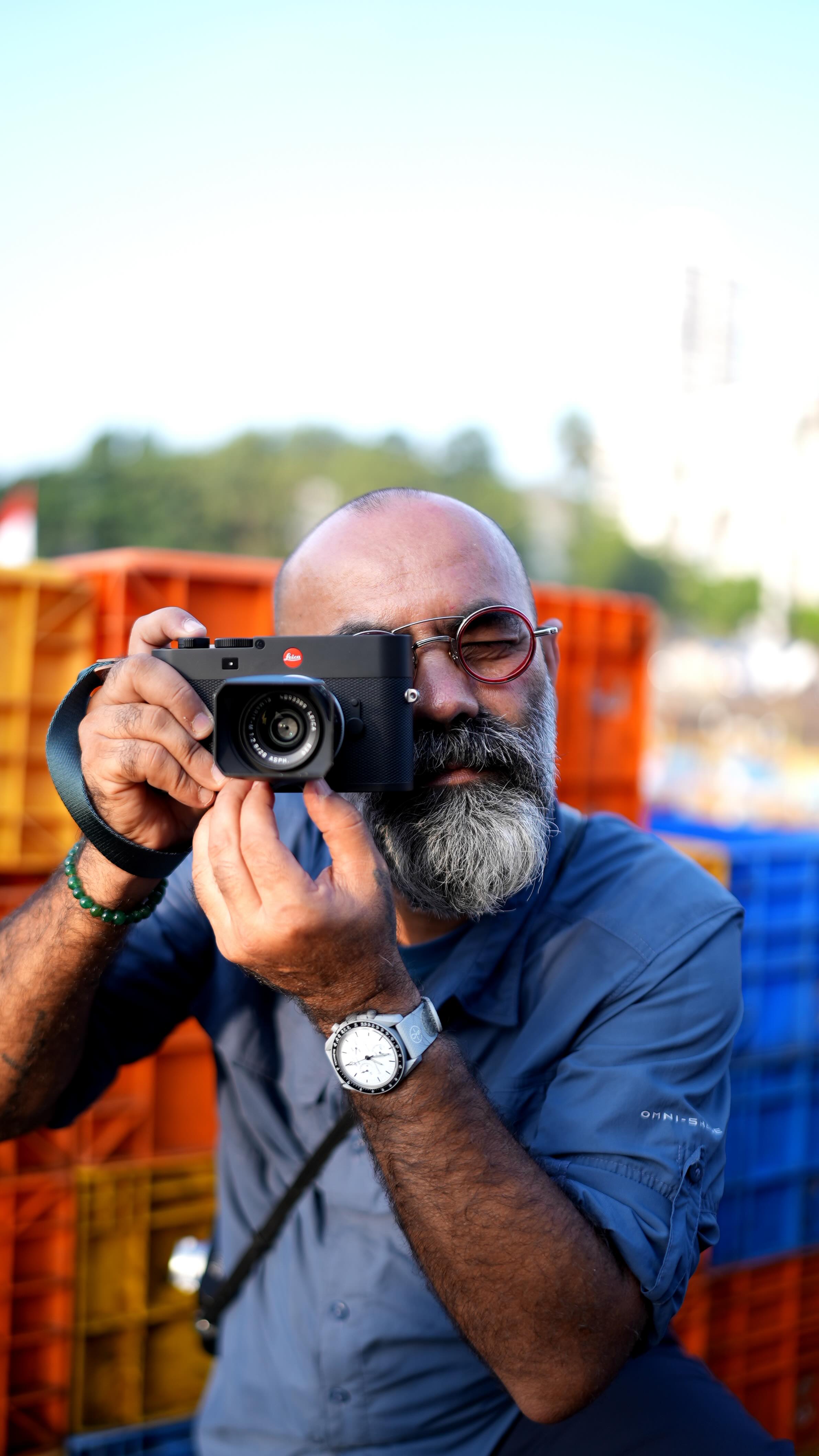 Instagram post by @vineet_vohra for Leica Camera. Caption reads: Leica Ambassador @vineet_vohra moves through the....