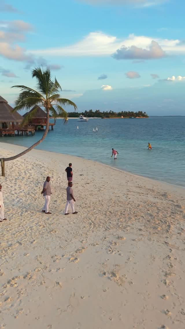 Instagram post by @fabriziorom for Visit Maldives. Caption reads: A football, a lagoon, a goal floating on....