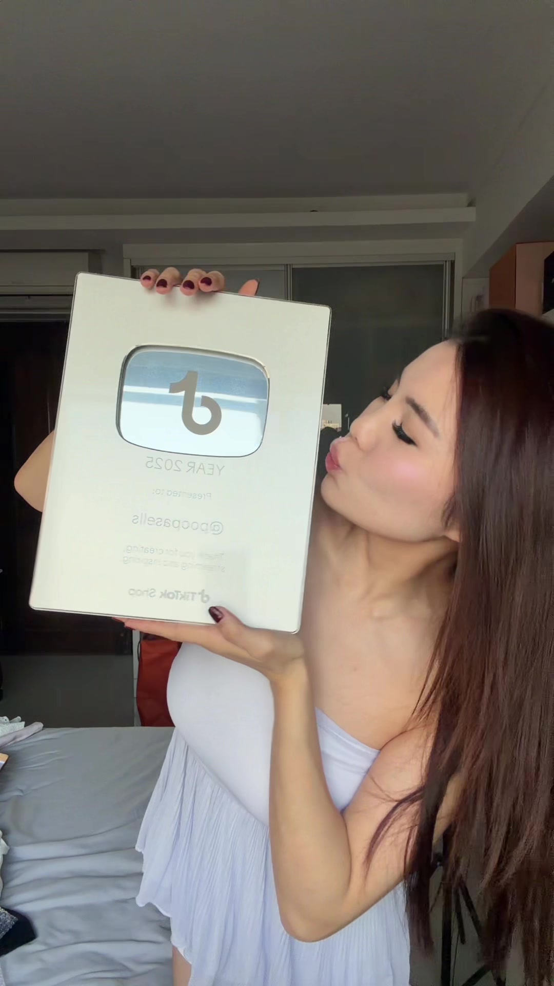 TikTok post by @poopasells for TikTok Shop. Caption reads: [...] a plaque girl! Thank you TikTok Singapore! ....