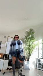 Instagram post by @artofstylemona for Ramy Brook. Caption reads: The coat of my dreams @ramybrook Comment “OUTFIT”....