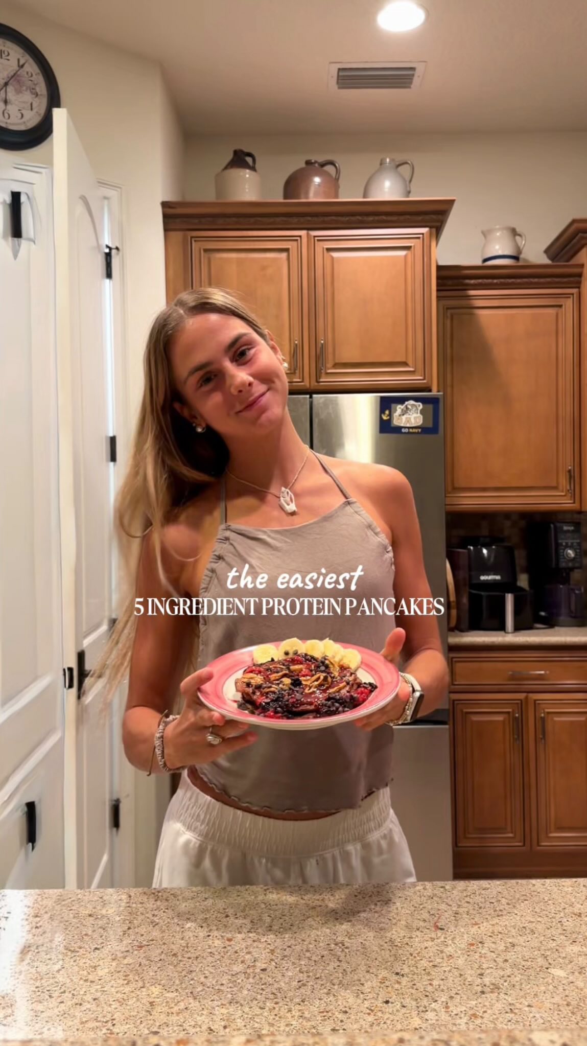Instagram post by @skyeehmann_ for Protein.com. Caption reads: The easiest 5 ingredient protein pancakes🥞 using....