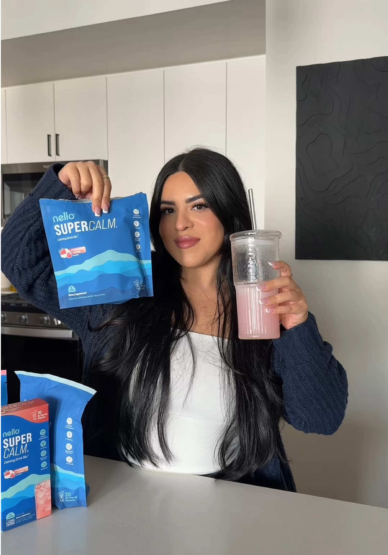 TikTok post by @staygoldlex for drinknello. Caption reads: As a mom, I’m always looking for ways to support....