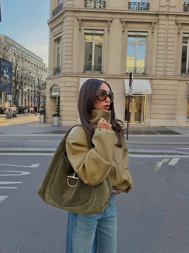 Instagram post by @aimazin for The Couture Club. Caption reads: Not from Paris, Madame 🫒 @thecoutureclub ad.