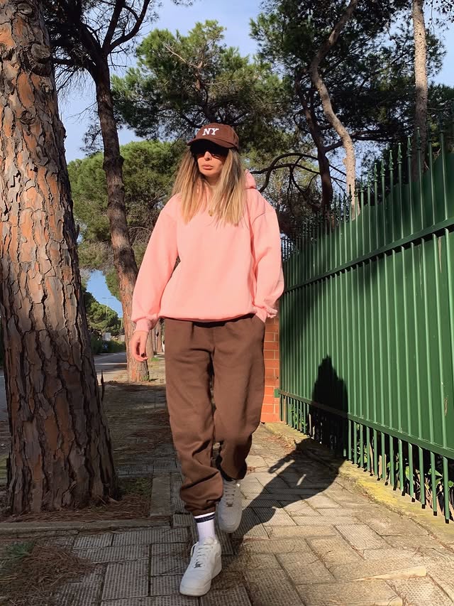 Instagram post by @pupilla_firenze for Hawkers. Caption reads: Pink + chocolate = perfect balance 💗🤎 Hat ID:....