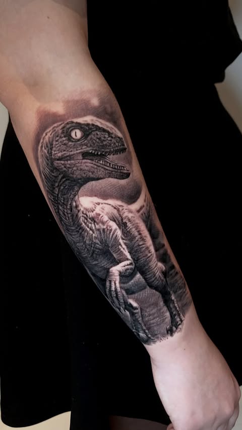 Instagram post by @perciastattoo for EZ Tattoo Supply. Caption reads: Jurassic Park tribute tattoo , new realistic black....