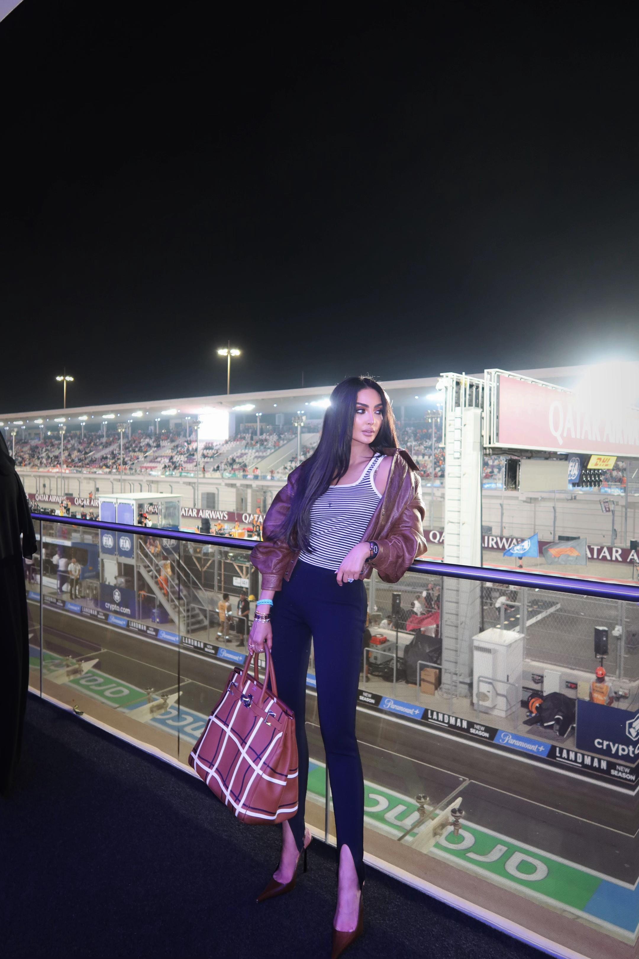 TikTok post by @nour for Visit Qatar. Caption reads: @Visit Qatar  #f1 #f1paddock #visitqatar .