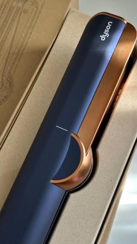 Instagram post by @anahita_bhooshan for Dyson. Caption reads: [...] of gift 🤍✨ Finally got my hands on the....
