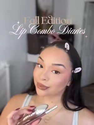 TikTok post by @julesss.xoo for Godmode Beauty. Caption reads: [...] the fall lip combos begin🍂☕️🪞🤎 | @GODMODE....