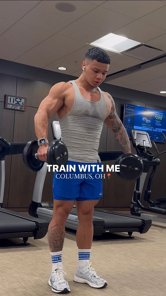 Instagram post by @ljmerced for HD MUSCLE. Caption reads: TRAIN WITH ME | Shoulders, Arms, Conditioning....