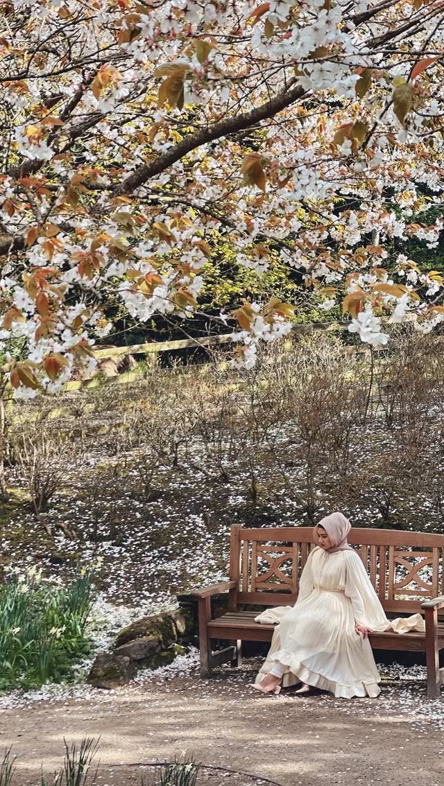 Instagram post by @the_travelette for VisitEngland. Caption reads: POV: It’s blossom season in the UK and you’re in....