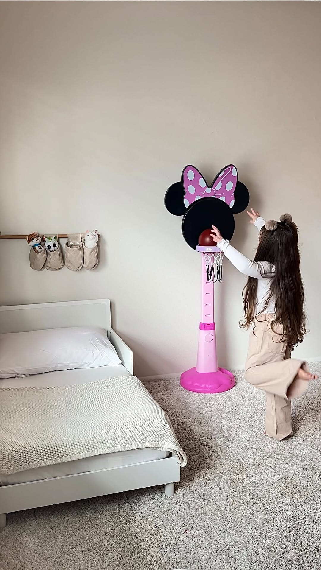 Instagram post by @lena_rymlianska for Delta Children. Caption reads: Minnie Mouse Plastic Basketball Set by Delta....