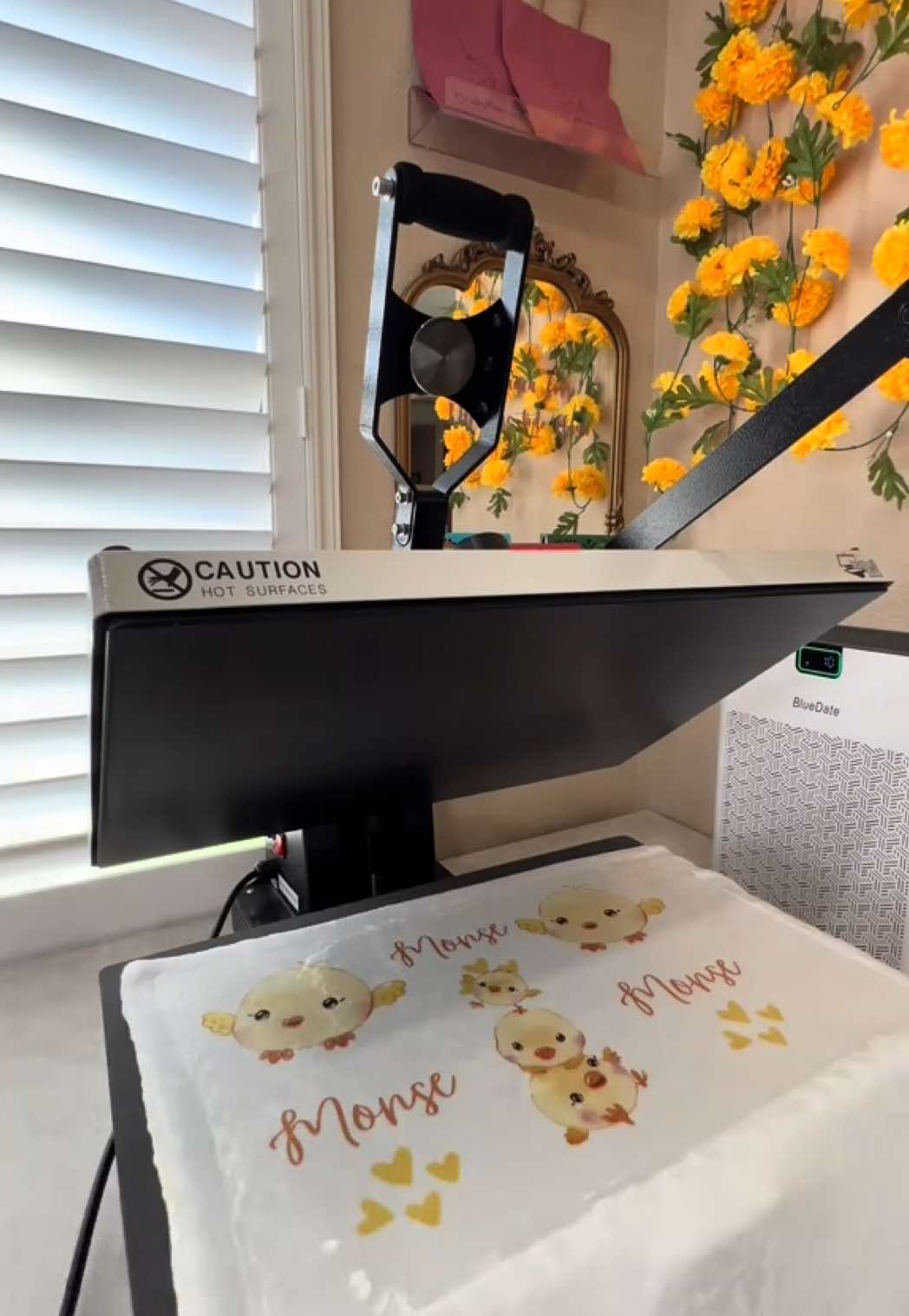 TikTok post by @craftykari for HeatPressNation. Caption reads: [...] I got my 16 x 24” heat press from....