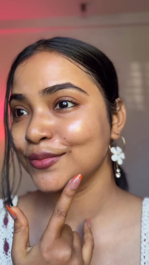 Instagram post by @ismaranikaganguly for DERMDOC. Caption reads: Comment "Link" Glow + SPF in one step? Yes please....