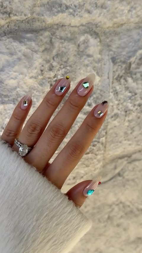 Instagram post by @nailsbyzola for OPI. Caption reads: [...] 🍬 nail tutorial 💎✨ Products I used: @opi....