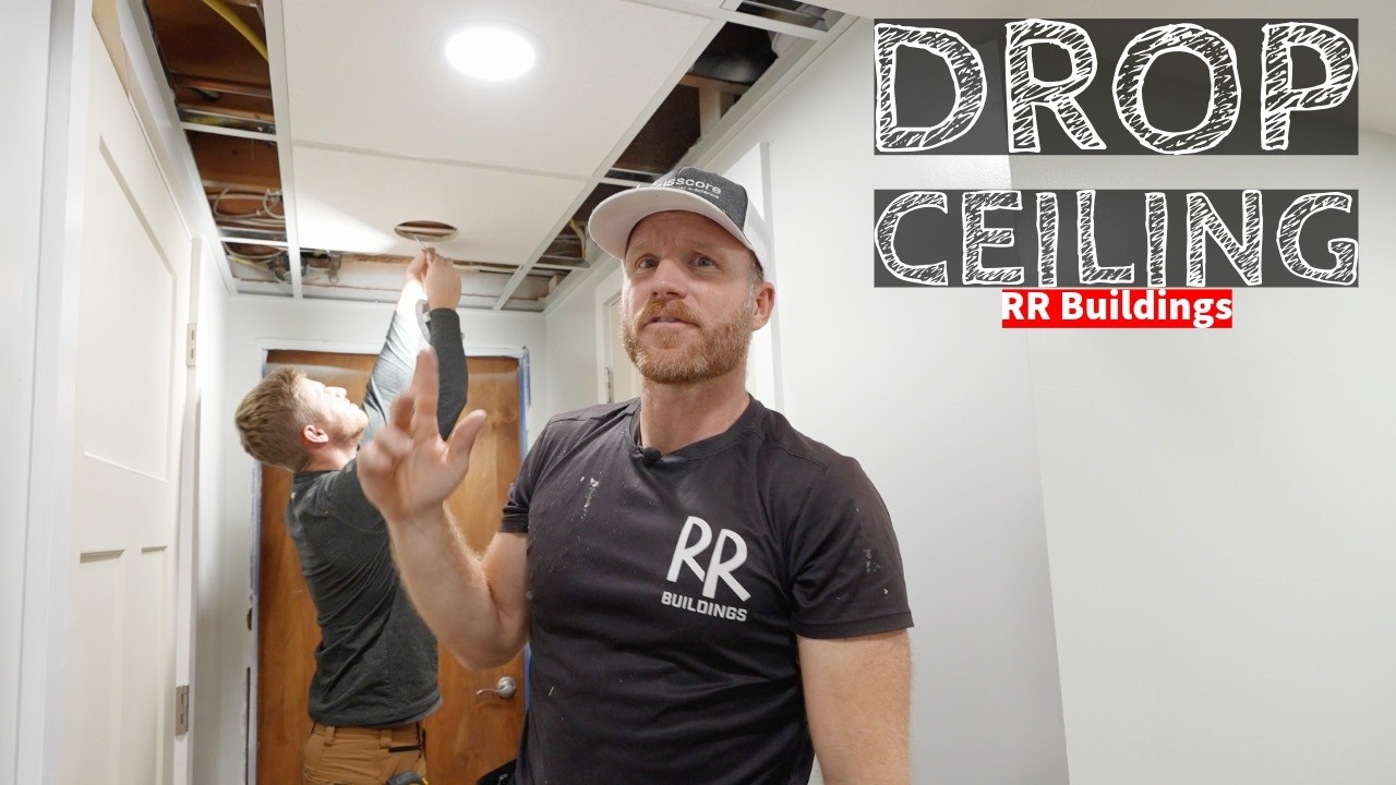 YouTube post by @RRBuildings for STABILA. Caption reads: Basement Drop Ceiling Install: Quicker and Easier....