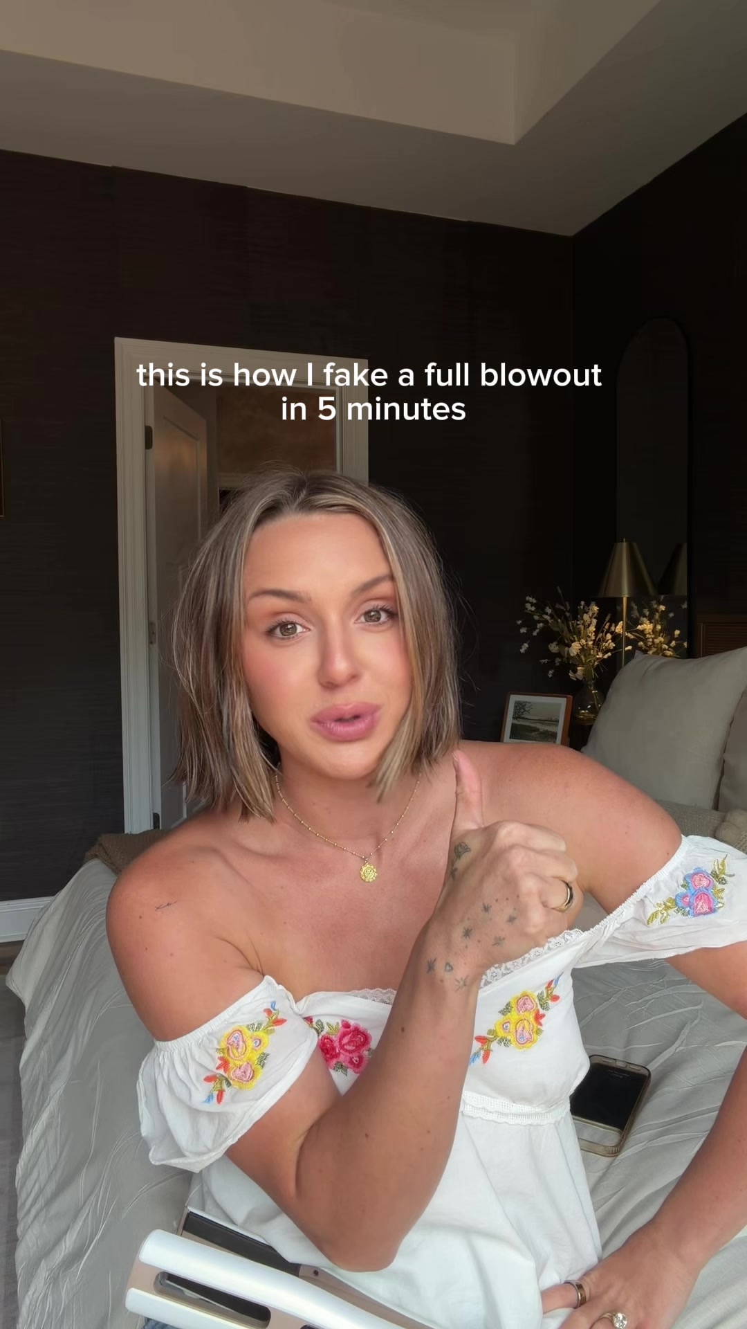 TikTok post by @emilyharrisking for Farouk Systems. Caption reads: When you want a blowout but only have five minutes....