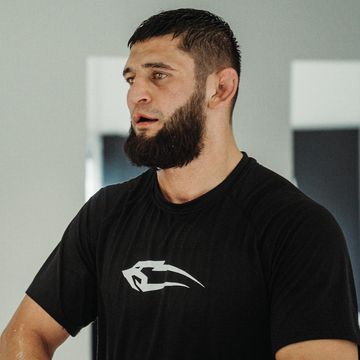 Instagram post by @khamzat_chimaev for RDX Sports. Caption reads: Training camp at @frontlinehasle....