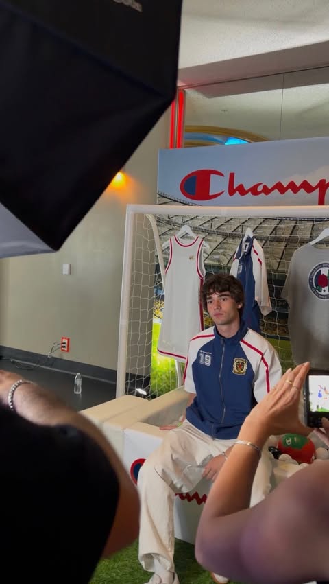 Instagram post by @wyattaube for Champion. Caption reads: My experience with champion ❤️💙 #partner....