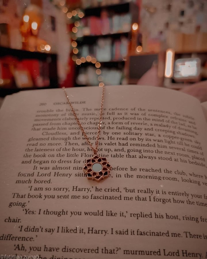 Instagram post by @fatimaa.zainab_ for HOLZKERN. Caption reads: [...] Neclace (Blue Nacre/Gold) by....