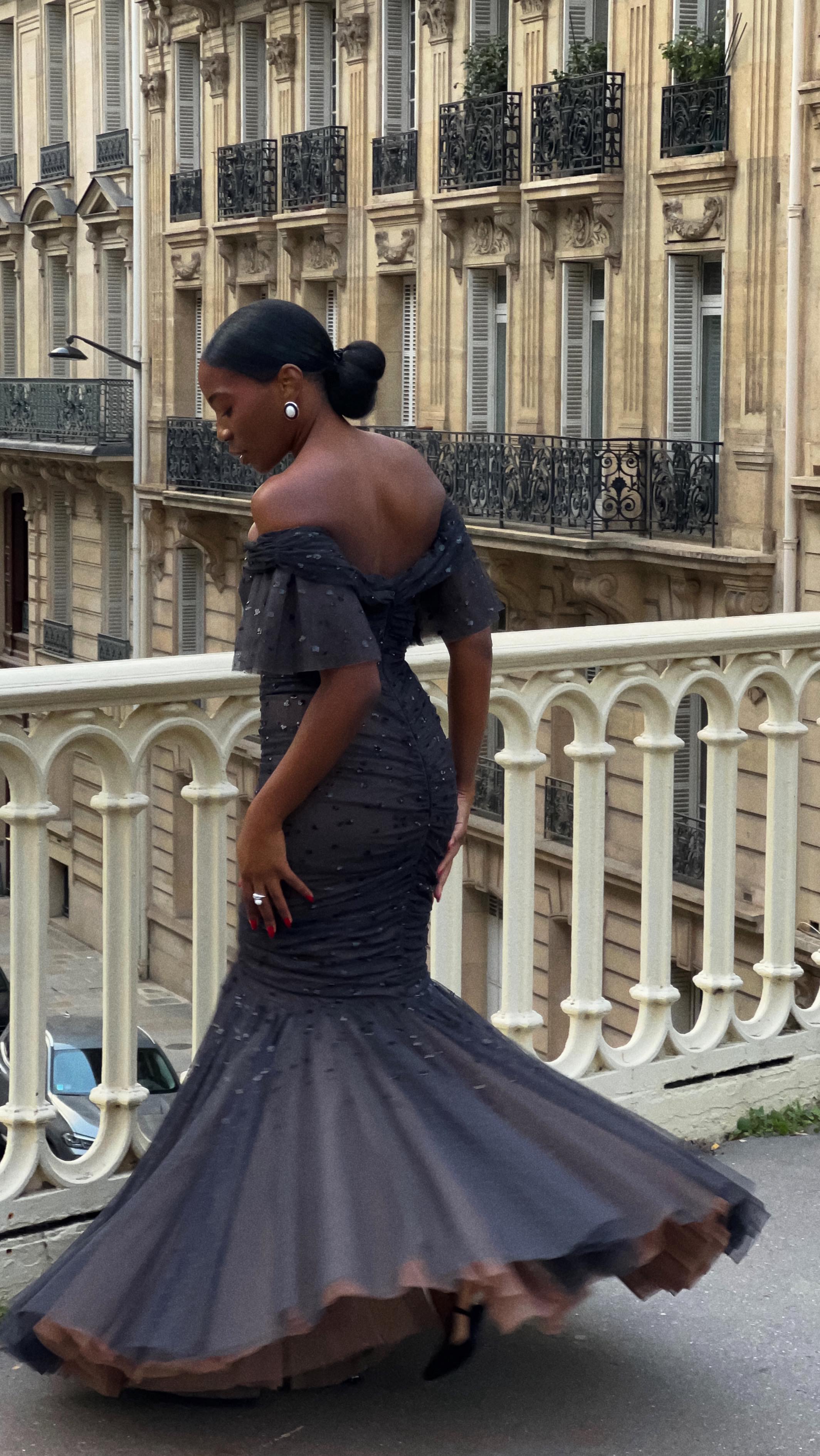 Instagram post by @armellebrown for Needle & Thread. Caption reads: Party dress season is open ✨🖤....