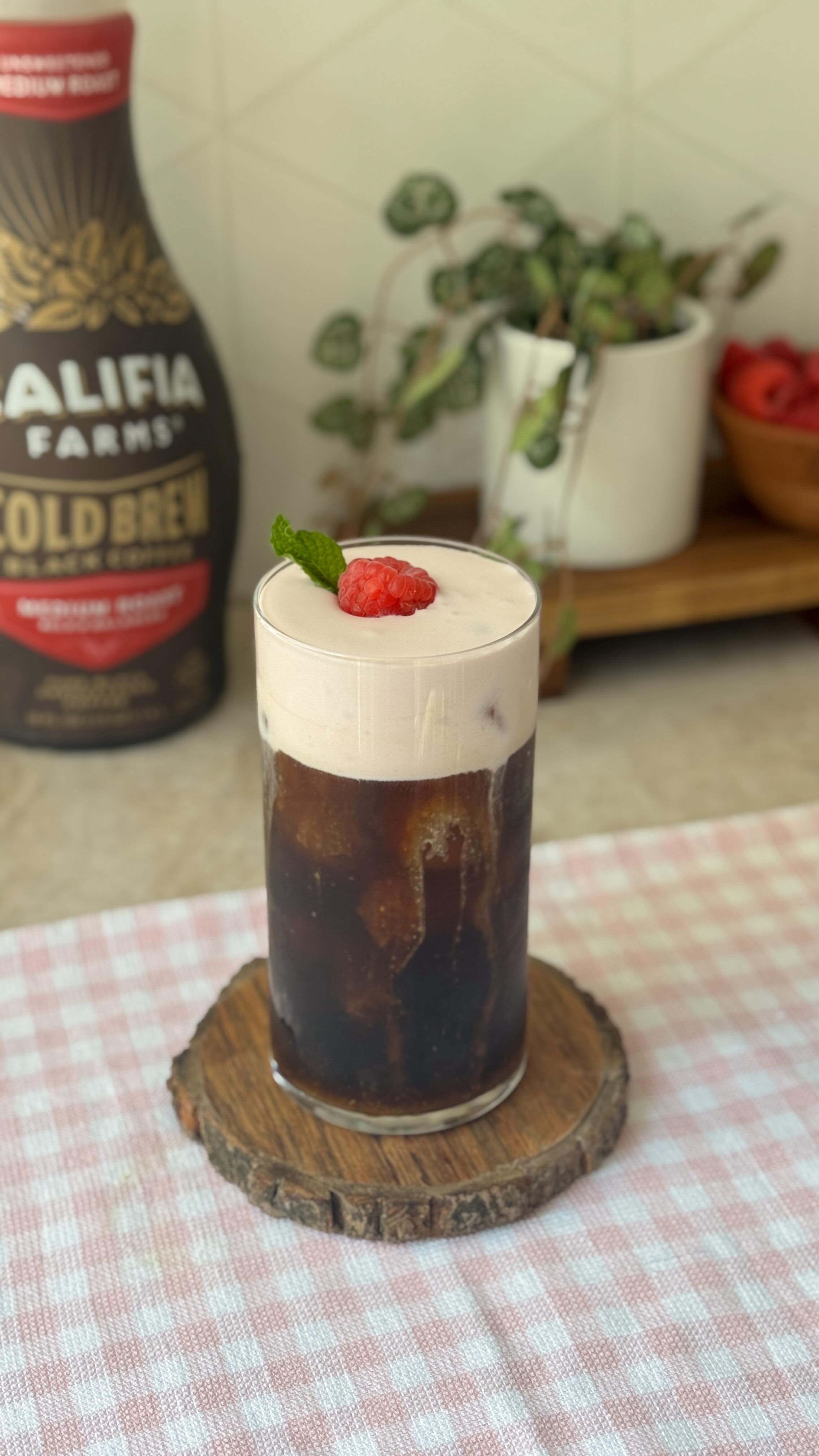 Instagram post by @milkteamali for Califia Farms. Caption reads: raspberry cream cold brew🌿☕️combining bold....