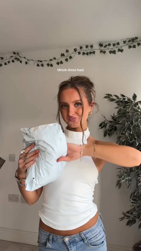 Instagram post by @claudiamorgn for TikTok Shop. Caption reads: a little try on haul @tiktokshop_uk 🐆 AD #gifted....