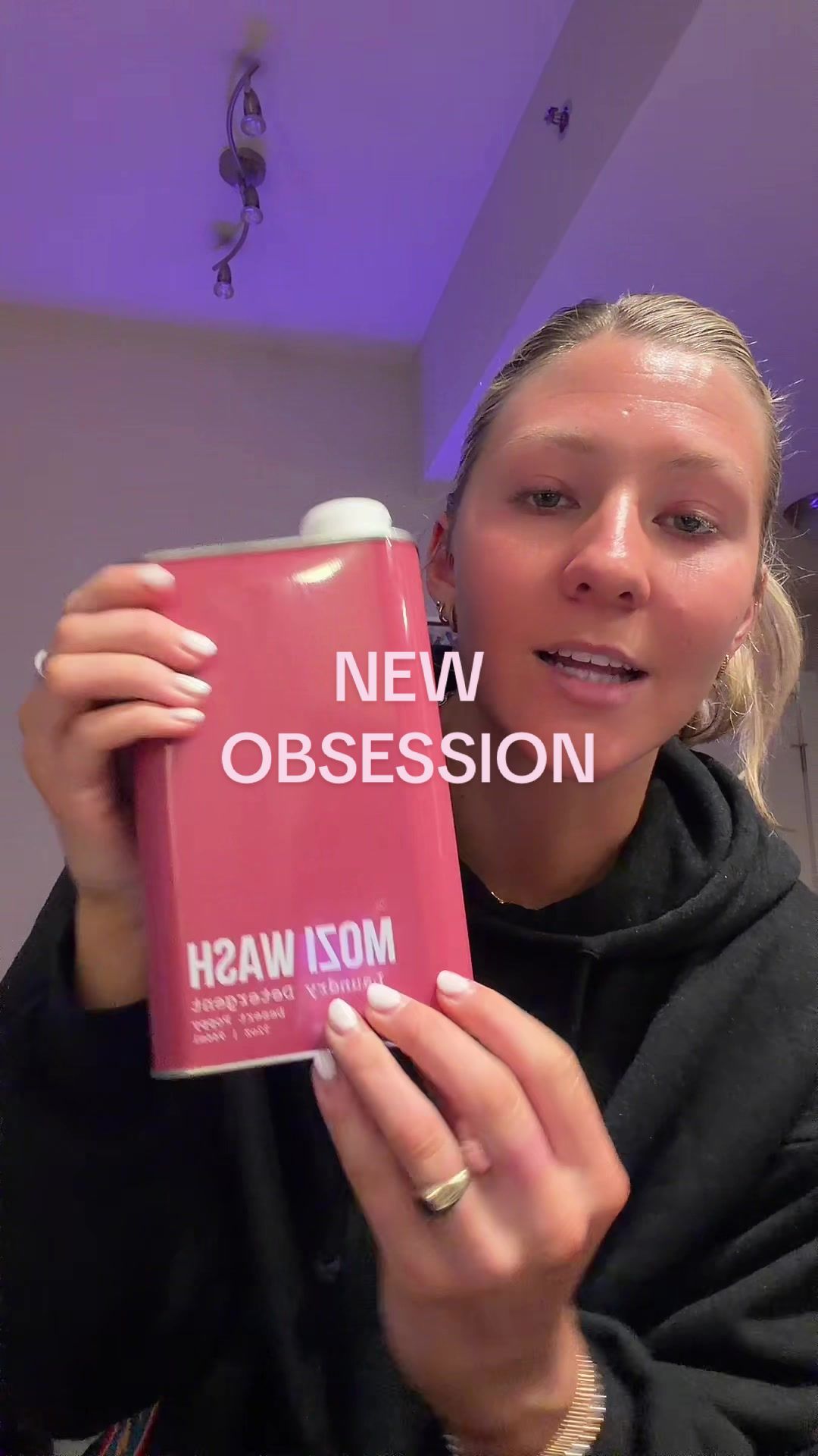 TikTok post by @evculbreath3 for Mozi Wash. Caption reads: Seriously my newest obsession @Mozi Wash & use....