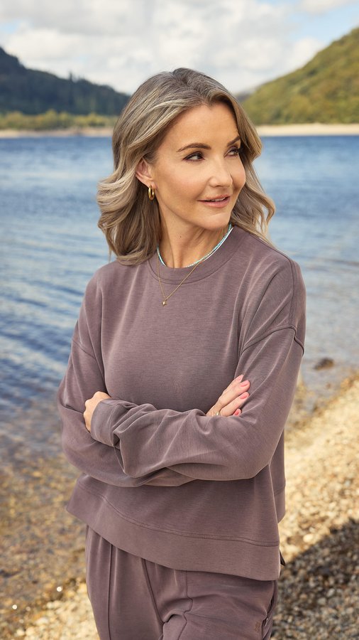 Instagram post by @helenskelton for GO Outdoors. Caption reads: The new-in @sweatybetty Sand Wash Cloudweight....