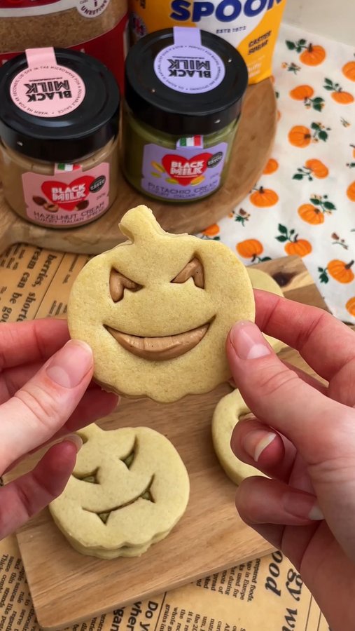 Instagram post by @sophsgoodies for Black Milk. Caption reads: Halloween Shortbread Cookies! Super easy and super....