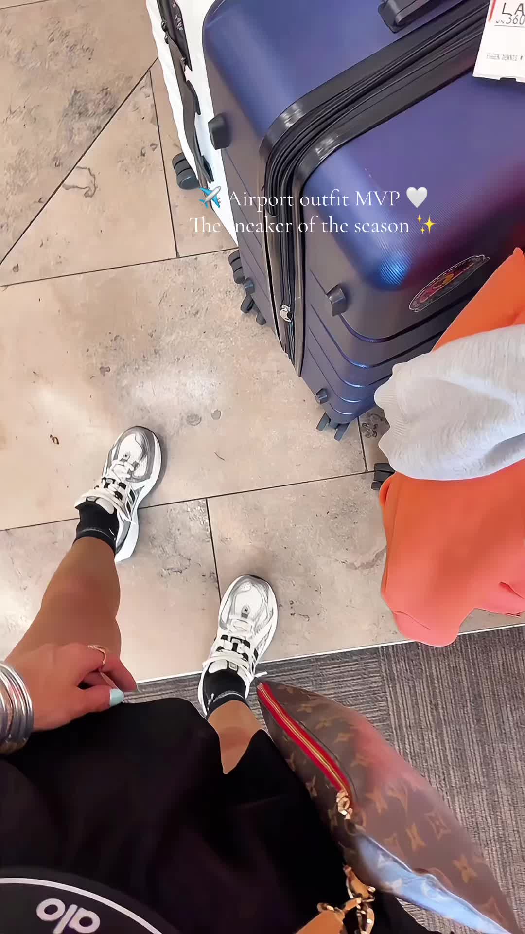 TikTok post by @adrianegweyn for Fly Kicks. Caption reads: [...] #TravelEssentials #SneakerStyle @Fly Kicks.