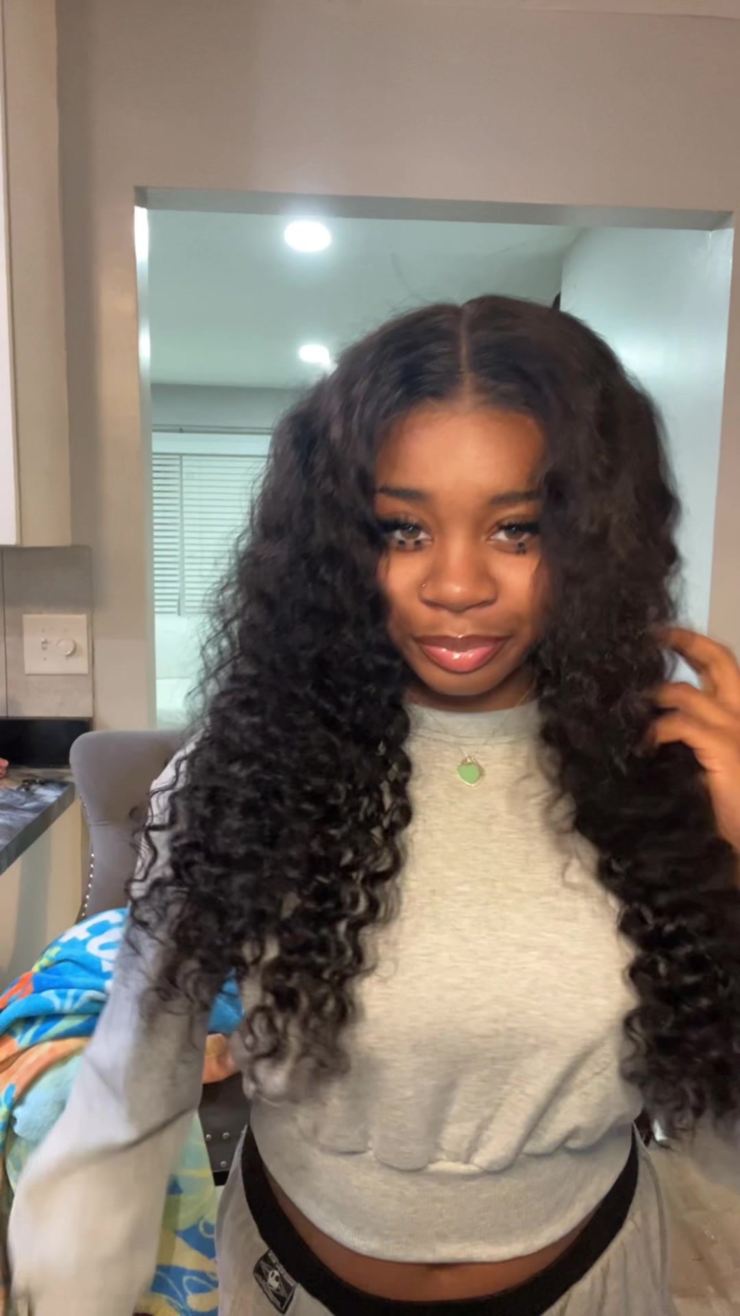 TikTok post by @sadeburnett for Karlami. Caption reads: [...] my own hair~Links are in the link tree.....