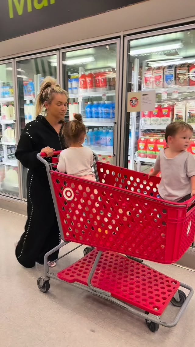 Instagram post by @haley_rolo for Kiki Milk. Caption reads: Twin mom Target essentials 🛒✨ Kiki Milk has....