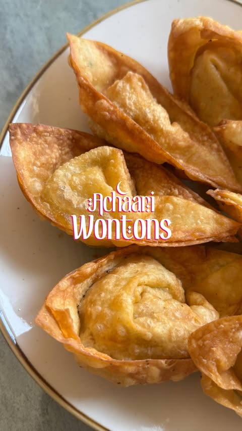 Instagram post by @kitchenwithanaya for National Foods. Caption reads: Let’s try wonton instead pakora and roll 😍. Boil....