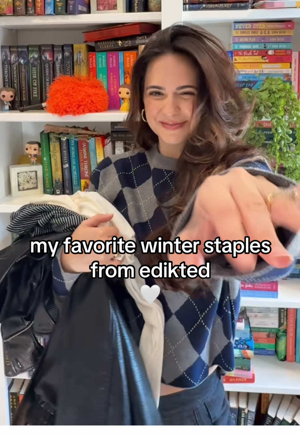 TikTok post by @amandasanz9 for Edikted. Caption reads: @Edikted is my go to for my winter staples ❄️🤍....