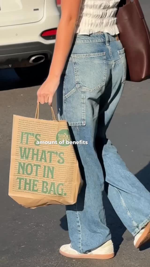 Instagram post by @caroline__mchugh for Suja Organic. Caption reads: @sujaorganic wellness shots are now available at....