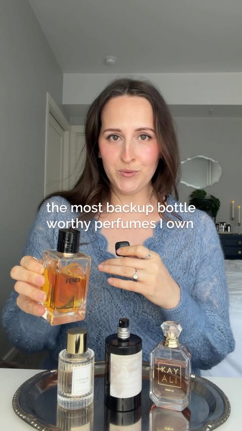 Instagram post by @kristinfragrances for Commodity Fragrances. Caption reads: 👀 what’s your MOST backup bottle worthy perfume?....